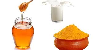 skin whitening home remedies Turmeric + milk + Honey